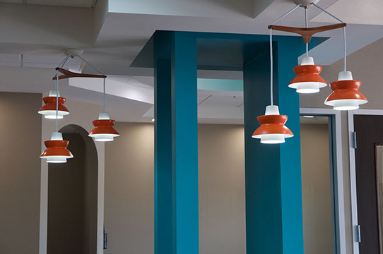 artistic photo of lights and beams in our office